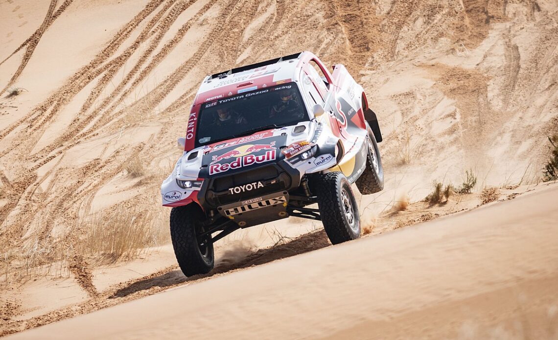 Al-Attyiah given belated FIA seat belt penalty, keeps Dakar lead
