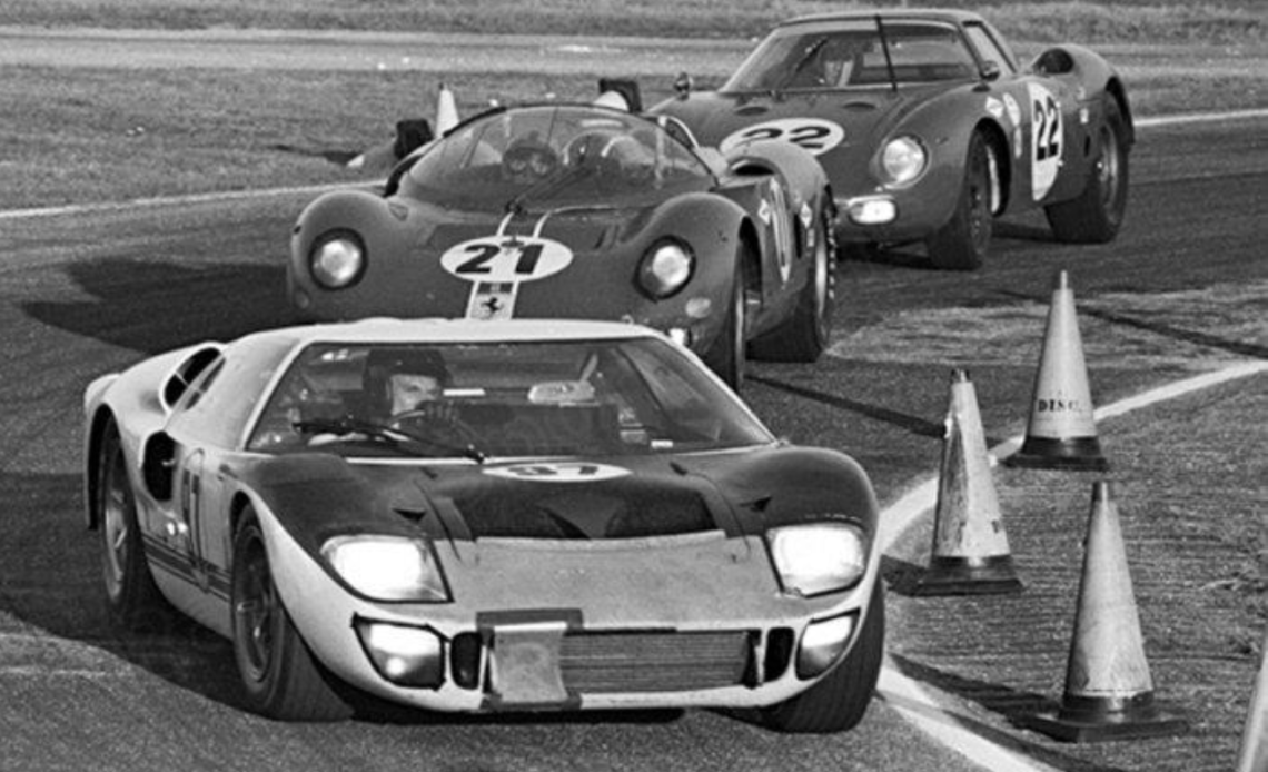 Ford Mk II closely followed by Ferrari prototypes during the 1966 Daytona 24