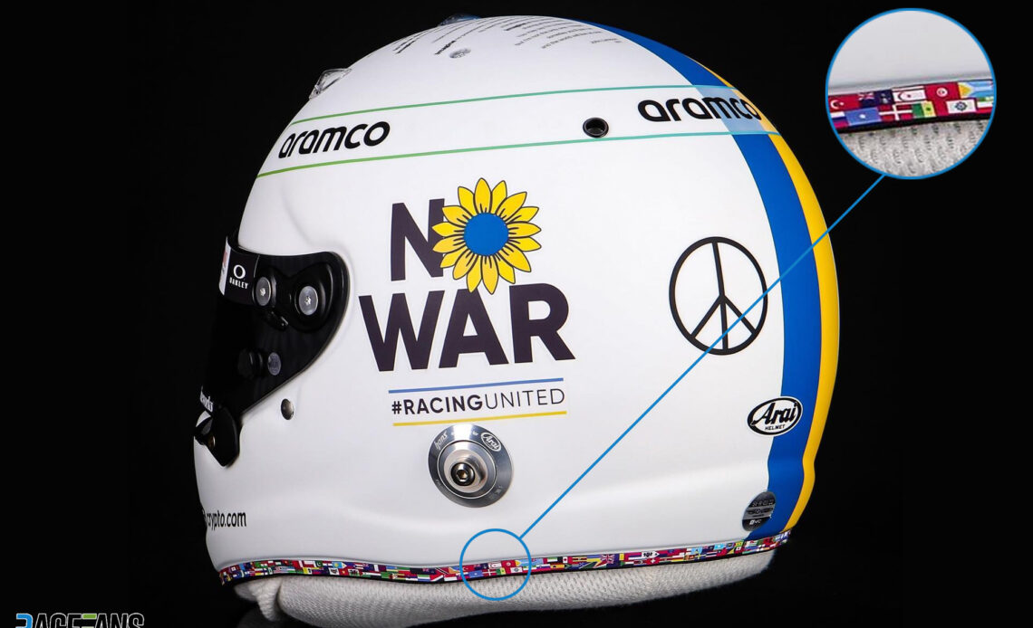 FIA urged to take action against Vettel over disputed flag on "No War" helmet · RaceFans