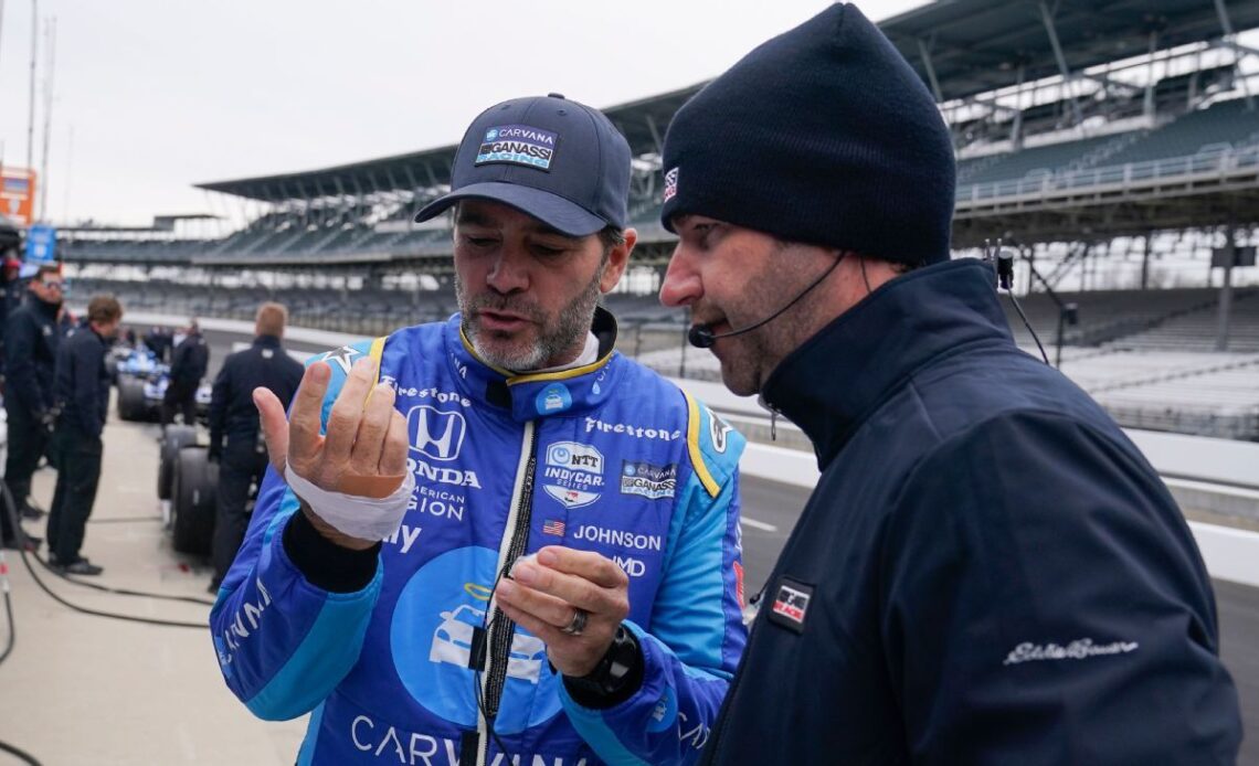 Jimmie Johnson checks hand during Indianapolis 500 test session