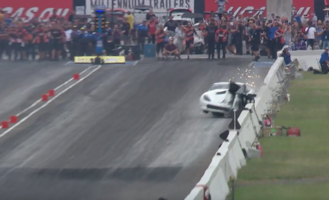 Rick Hord's Pro Mod car hits both walls in Indy