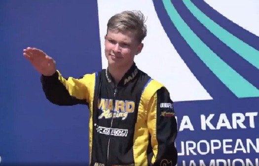 Russian race driver shamed after giving a Nazi salute at the European Karting Championship Podium…