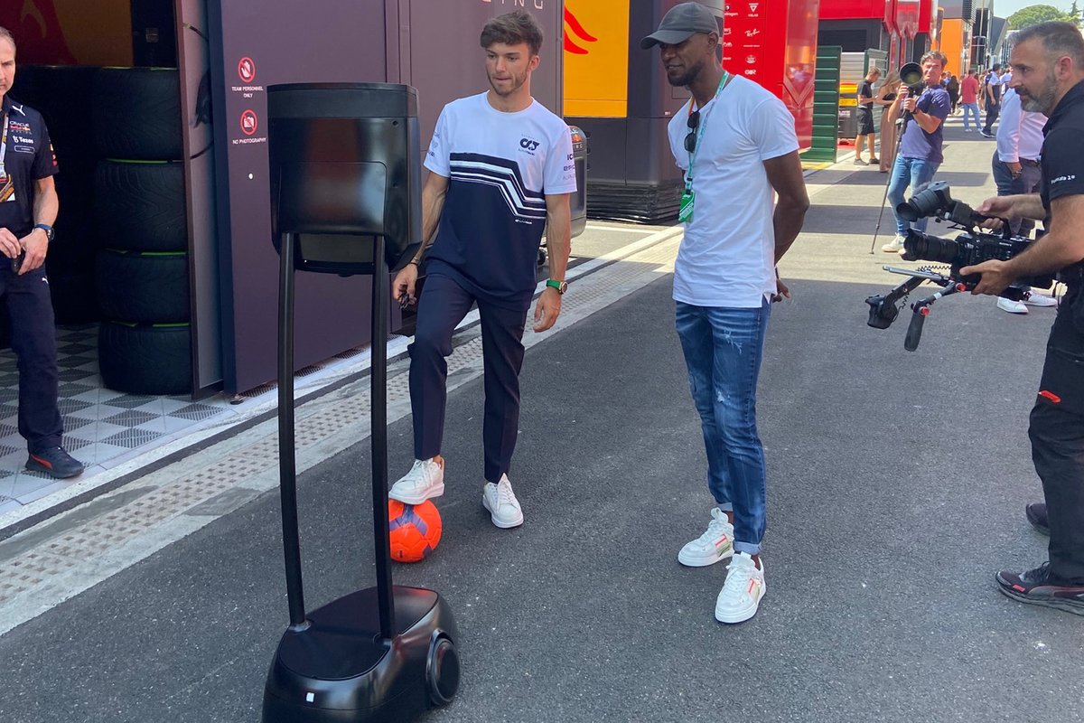 Pierre Gasly, AlphaTauri and Eric Abidal with an F1 paddock robot