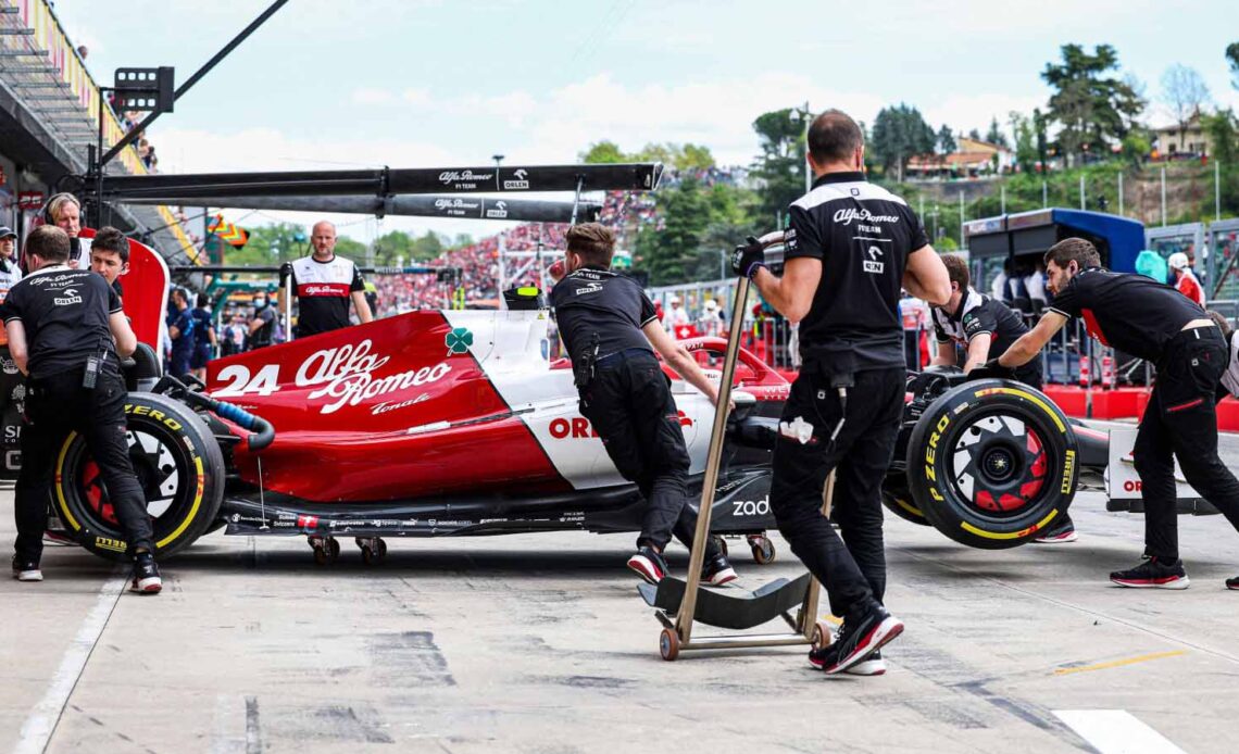 Zhou Guanyu is taken into his garage. Imola April 2022.