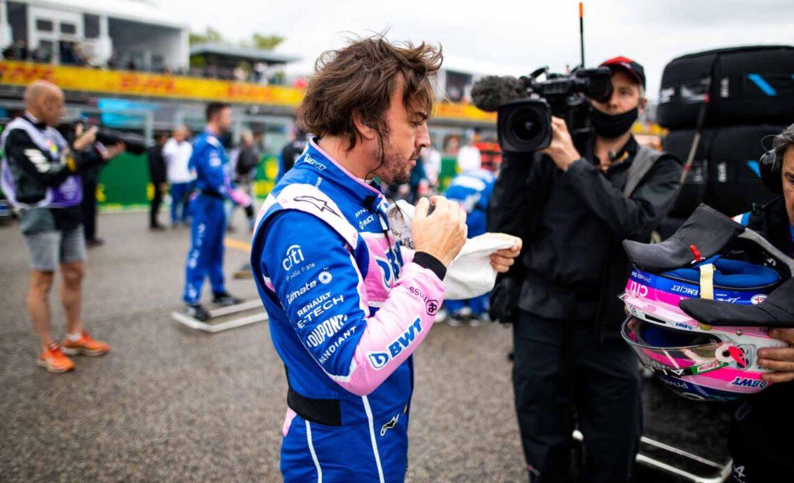 Fernando Alonso prepares on the grid. Imola April 2022.