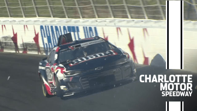 Corey LaJoie slams into the wall during Cup Series practice at Charlotte