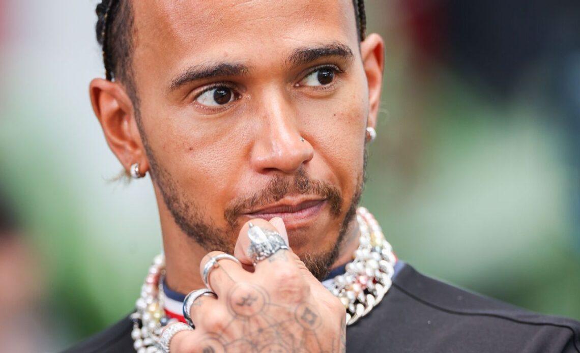 Defiant Lewis Hamilton says piercing will stay