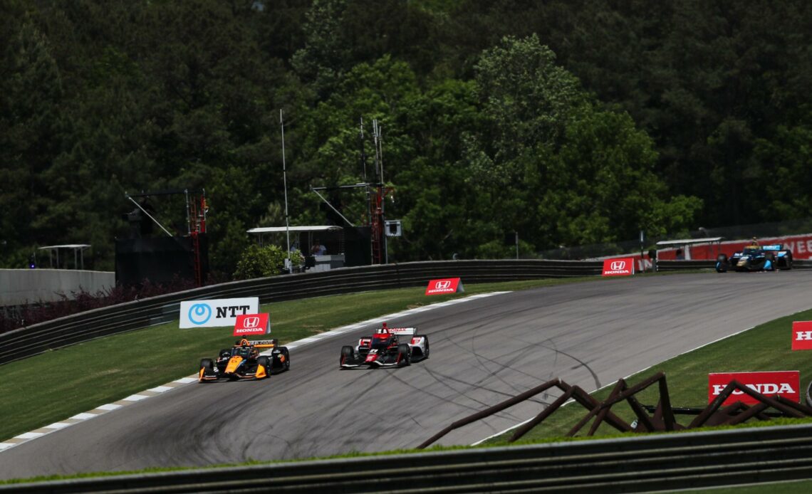 Pato O'Ward makes the race-winning pass on Rinus VeeKay at the IndyCar race at Barber Motorsports Park