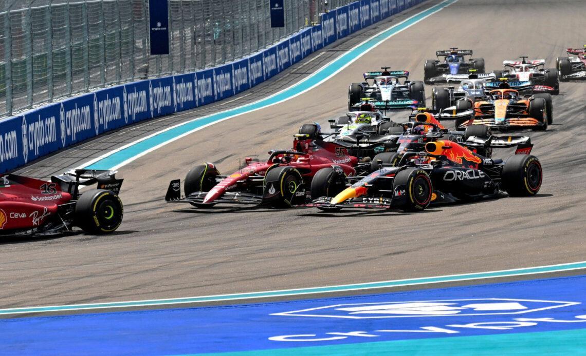 Carlos Sainz trying to defend against Max Verstappen at the start. Miami May 2022