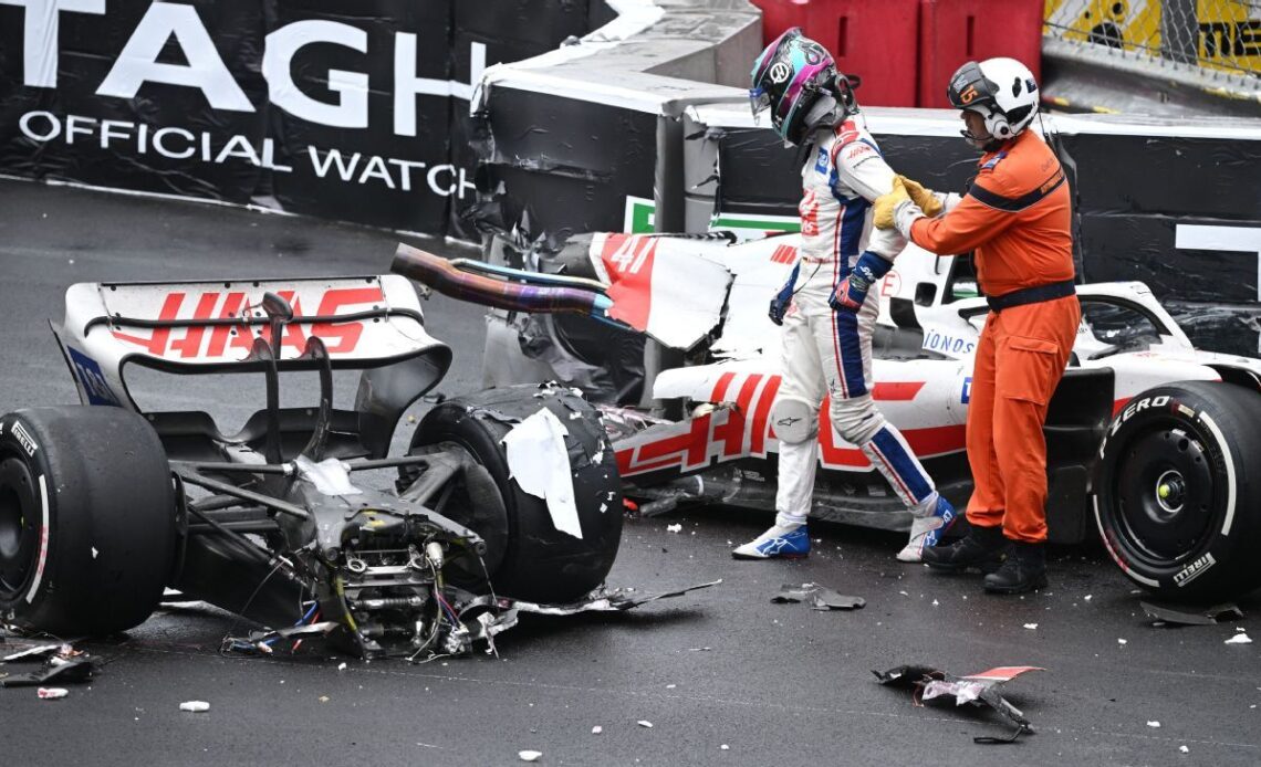 Mick Schumacher car splits into two pieces in big crash at wet Monaco Grand Prix