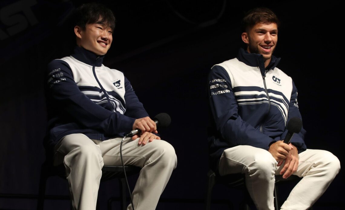 Yuki Tsunoda and Pierre Gasly, AlphaTauri, sit together talking. Australia, April 2022.