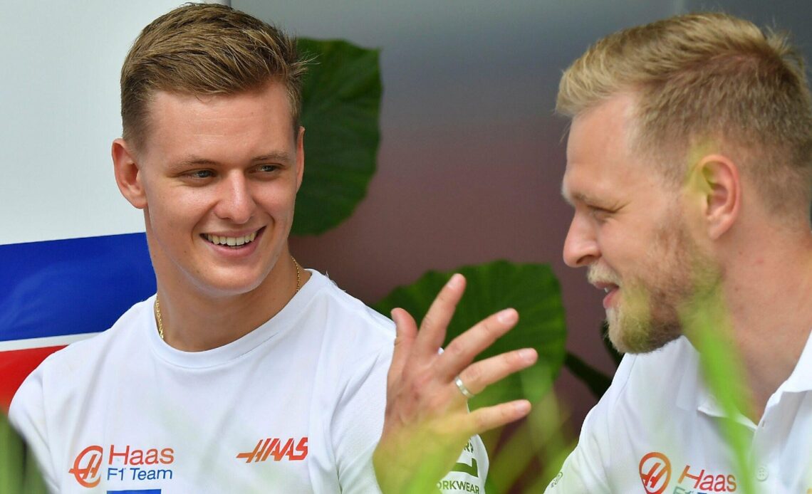 Kevin Magnussen and Mick Schumacher, Haas, talk in Miami. United States, May 2022.