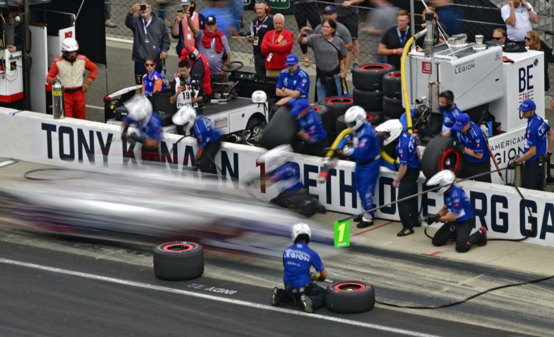 Tony Kanaan pulling into his pit box on Carb Day in 2022