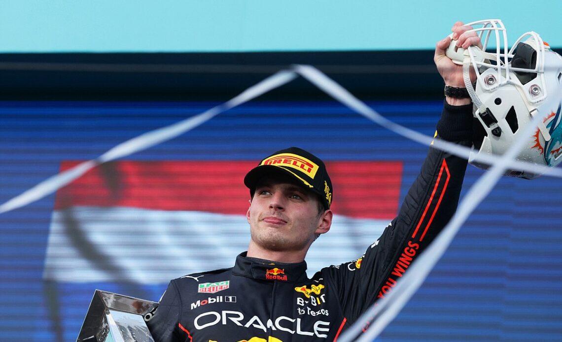 Verstappen holds off Leclerc to win after late SC