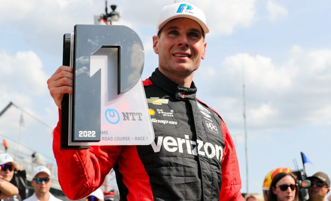 Will Power holding the NTT P1 Pole Award at Indianapolis