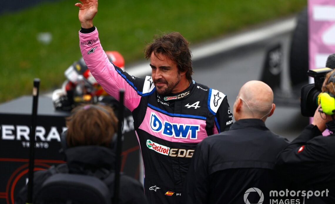 Fernando Alonso, Alpine F1 Team, waves to fans after Qualifying on the front row