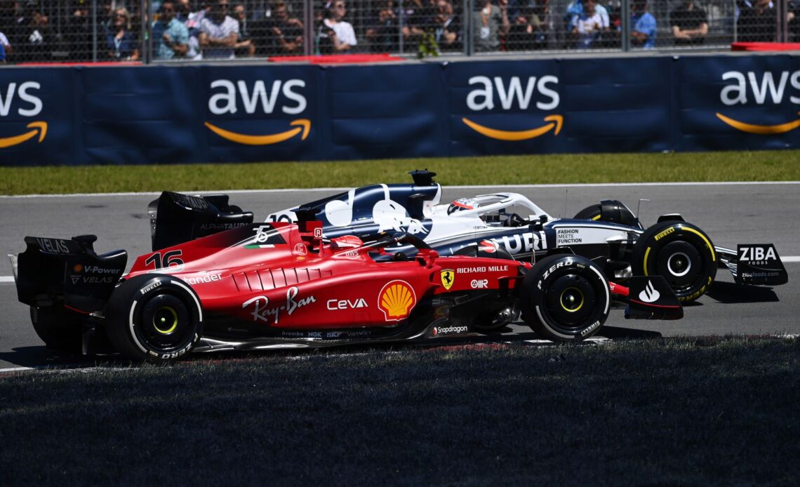 Pierre Gasly of France driving the (10) Scuderia AlphaTauri AT03 leads Charles Leclerc of Monaco driving the (16) Ferrari F1-75 during the F1 Grand Prix of Canada at Circuit Gilles Villeneuve on June 19, 2022 in Montreal, Quebec. (Photo by Dan Mullan/Getty Images)