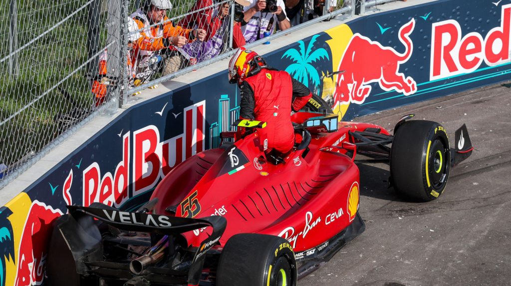 Carlos Sainz climbs out of his F1-75 after crashing into the barrier. Miami May 2022