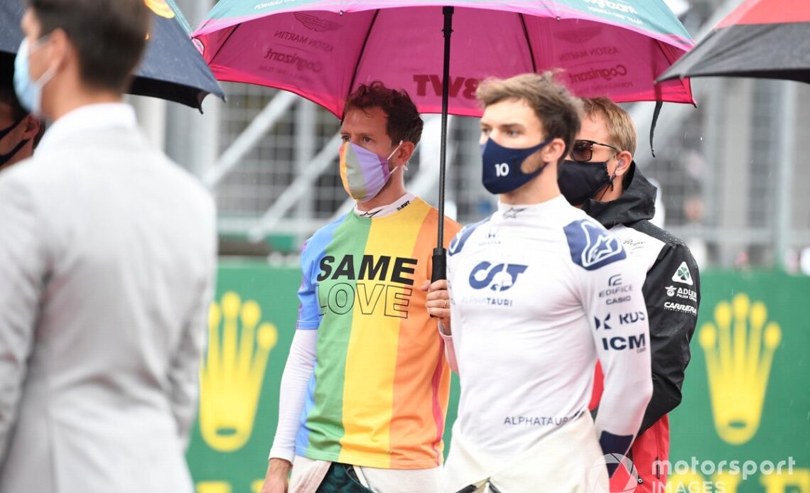 Sebastian Vettel, Aston Martin, and Pierre Gasly, AlphaTauri AT02, on the grid