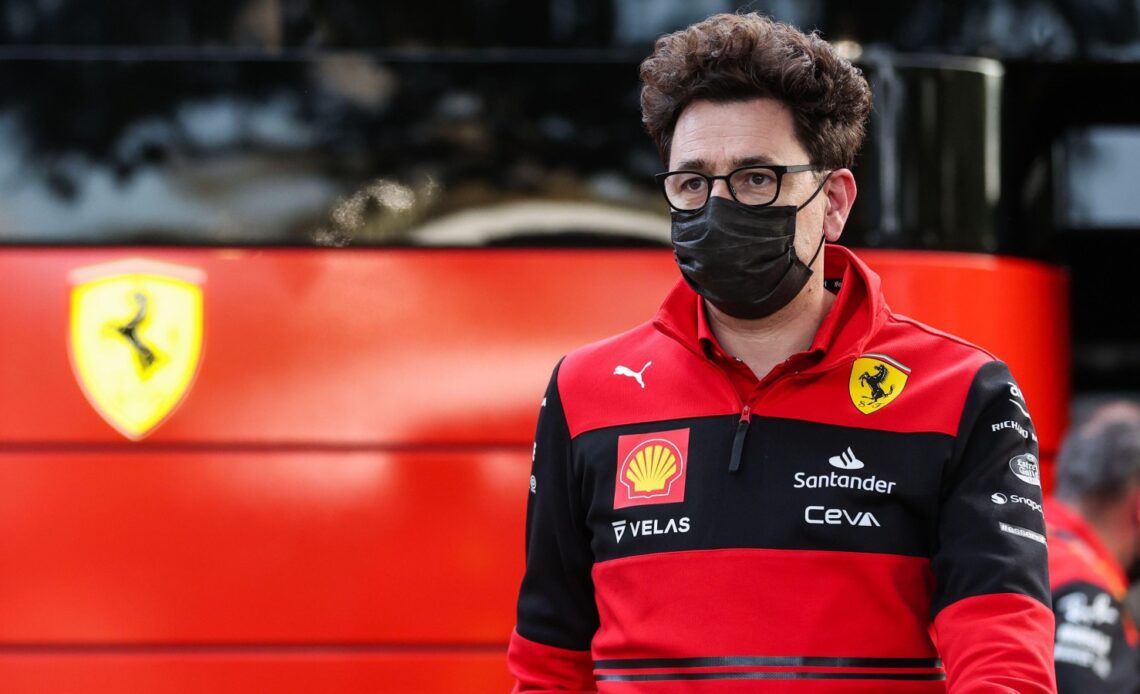 Ferrari principal Mattia Binotto walks through the paddock. Australia, April 2022.