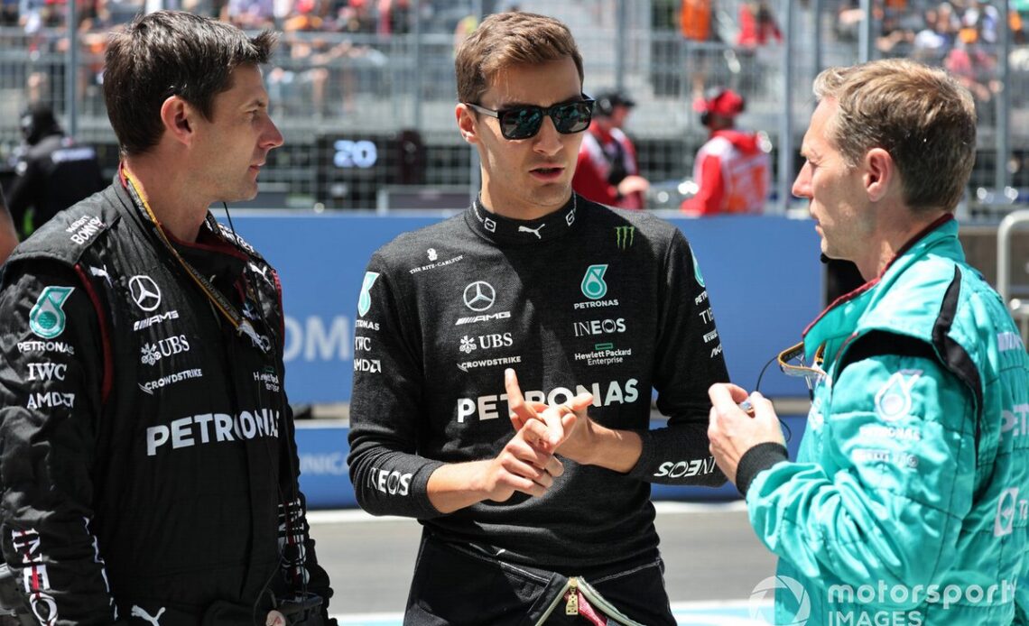 George Russell, Mercedes-AMG, on the grid with team mates