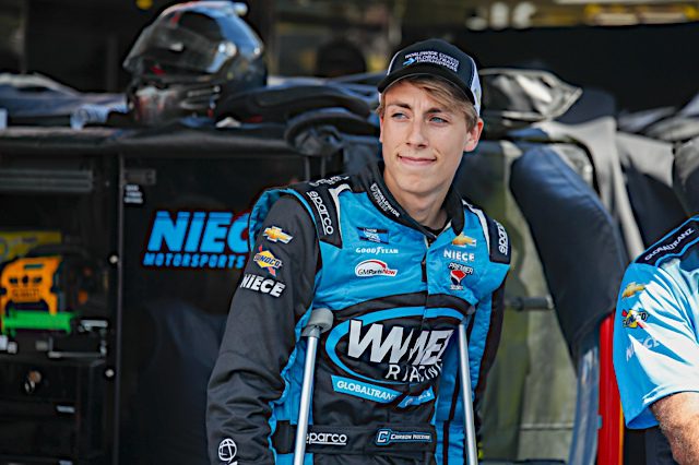 Carson Hocevar on crutches at the NASCAR Truck Series race at Sonoma. Photo: NKP