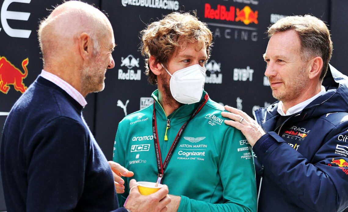 Sebastian Vettel talks to Adrian Newey and Christian Horner of Red Bull. Spain, February 2022.