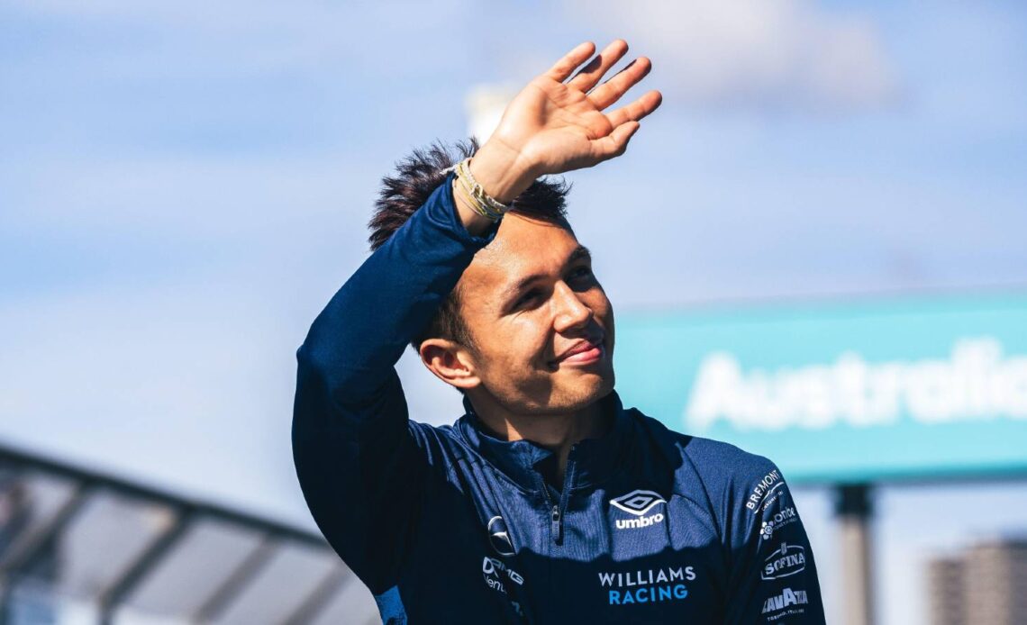 Alex Albon waves to the crowd at the Australian GP. Melbourne April 2022.