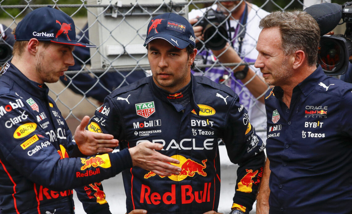 Max Verstappen explaining to Sergio Perez and Christian Horner. Monaco May 2022