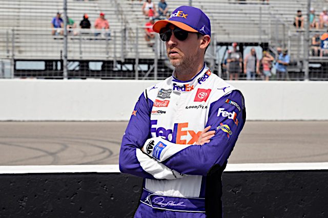 Denny Hamlin with folded arms at 2022 World Wide Technology Raceway at Gateway, NKP