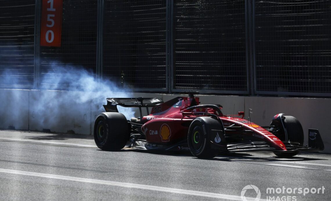 Charles Leclerc, Ferrari F1-75, limps back to the pit trailing smoke