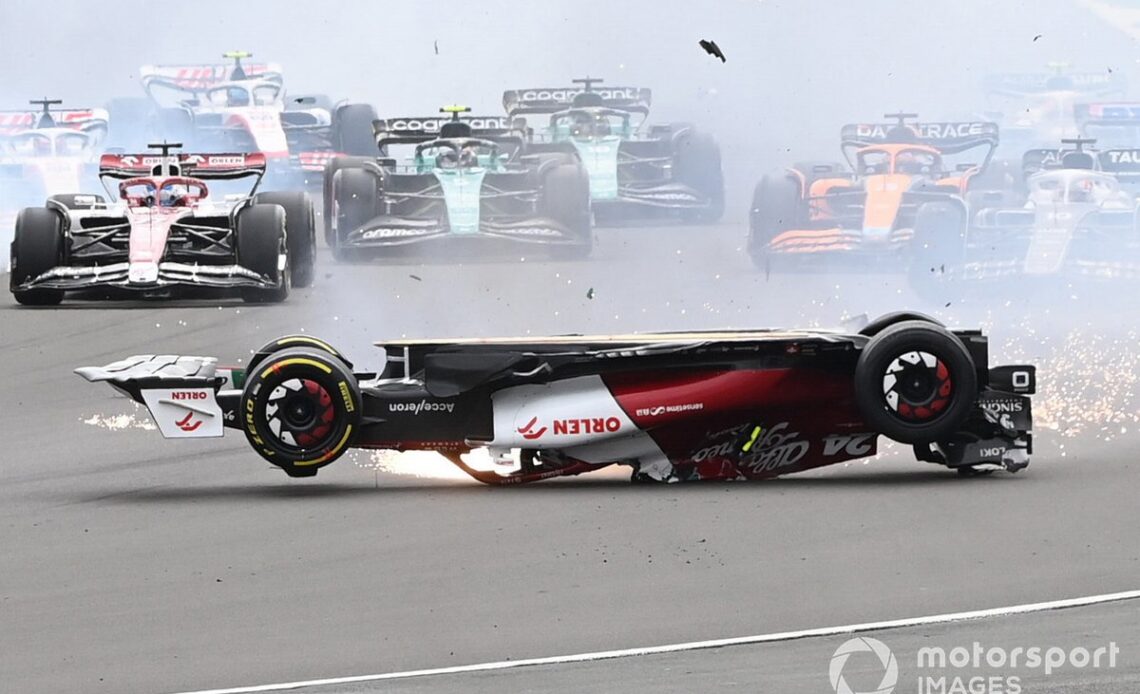 The accident involving Zhou Guanyu, Alfa Romeo C42 at the start of the race