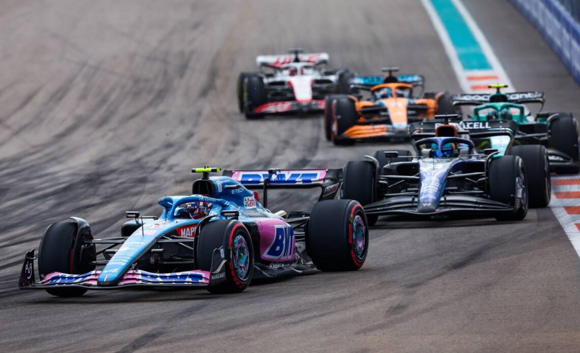 Esteban Ocon leads a train of cars. Miami May 2022.