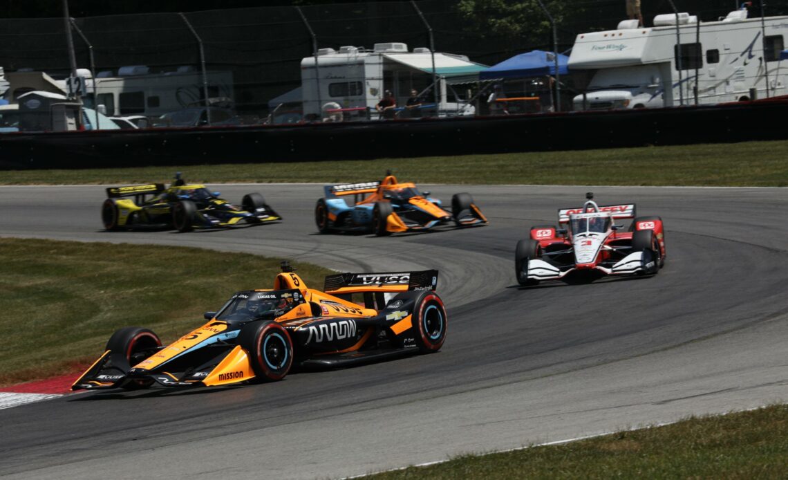Pato O'Ward leads Scott McLaughlin and Arrow McLaren SP teammate Felix Rosenqvist at the 2022 Honda Indy 200 at Mid-Ohio Sports Car Course