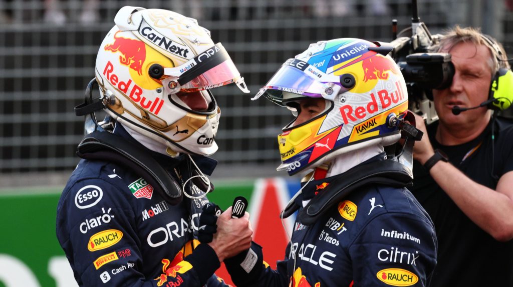 Max Verstappen shakes hands with his team-mate Sergio Perez. Australia April 2022