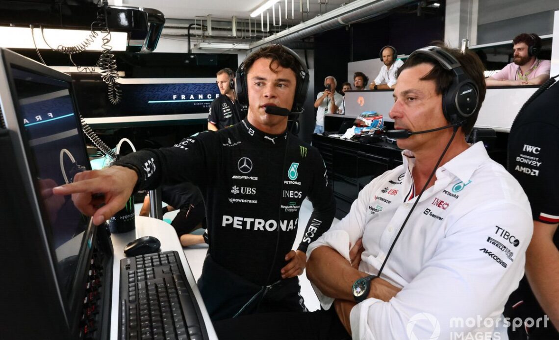 Nyck de Vries, Test and Reserve Driver, Mercedes AMG, analyses data with Toto Wolff, Team Principal and CEO, Mercedes AMG