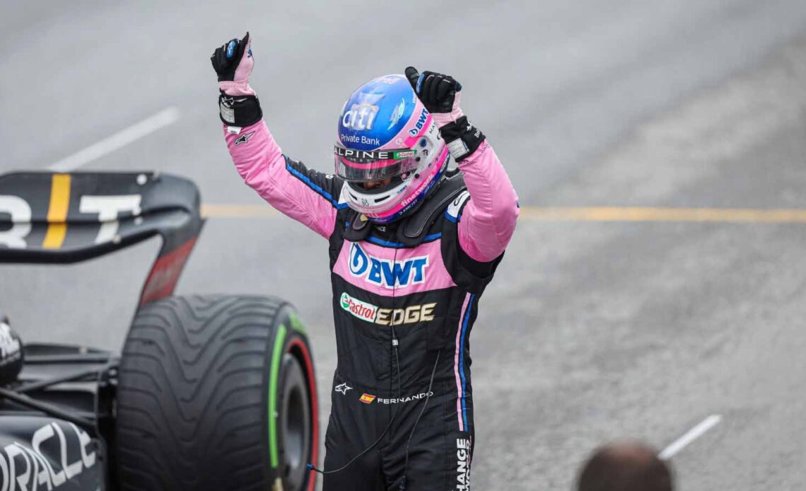 Fernando Alonso holds his hands up. Montreal June 2022.