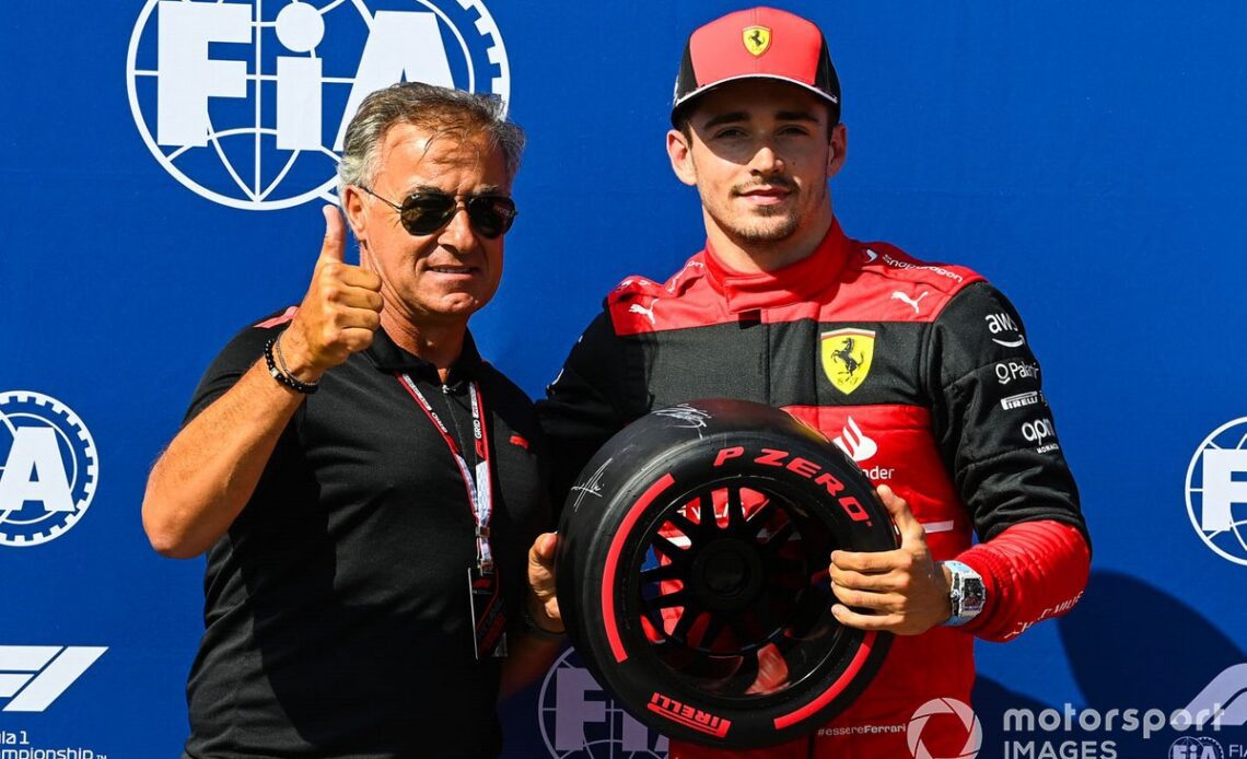 Charles Leclerc, Ferrari, receives the Pirelli Pole Position Award from Jean Alesi