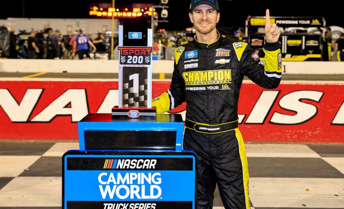 Grant Enfinger, driver of the #23 Champion Power Equipment Chevrolet, celebrates in victory lane after winning the NASCAR Camping World Truck Series TSport 200 at Indianapolis Raceway Park on July 29, 2022 in Indianapolis, Indiana. (Photo by Justin Casterline/Getty Images)