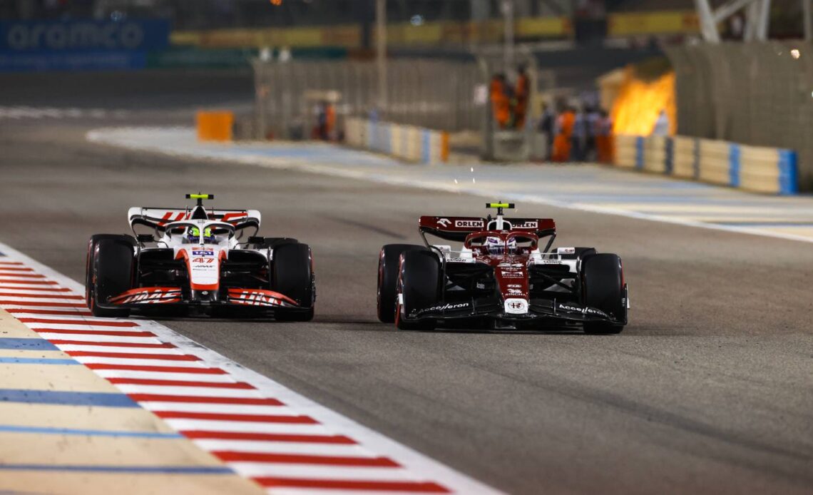 Guanyu Zhou alongside Mick Schumacher. Bahrain March 2022.