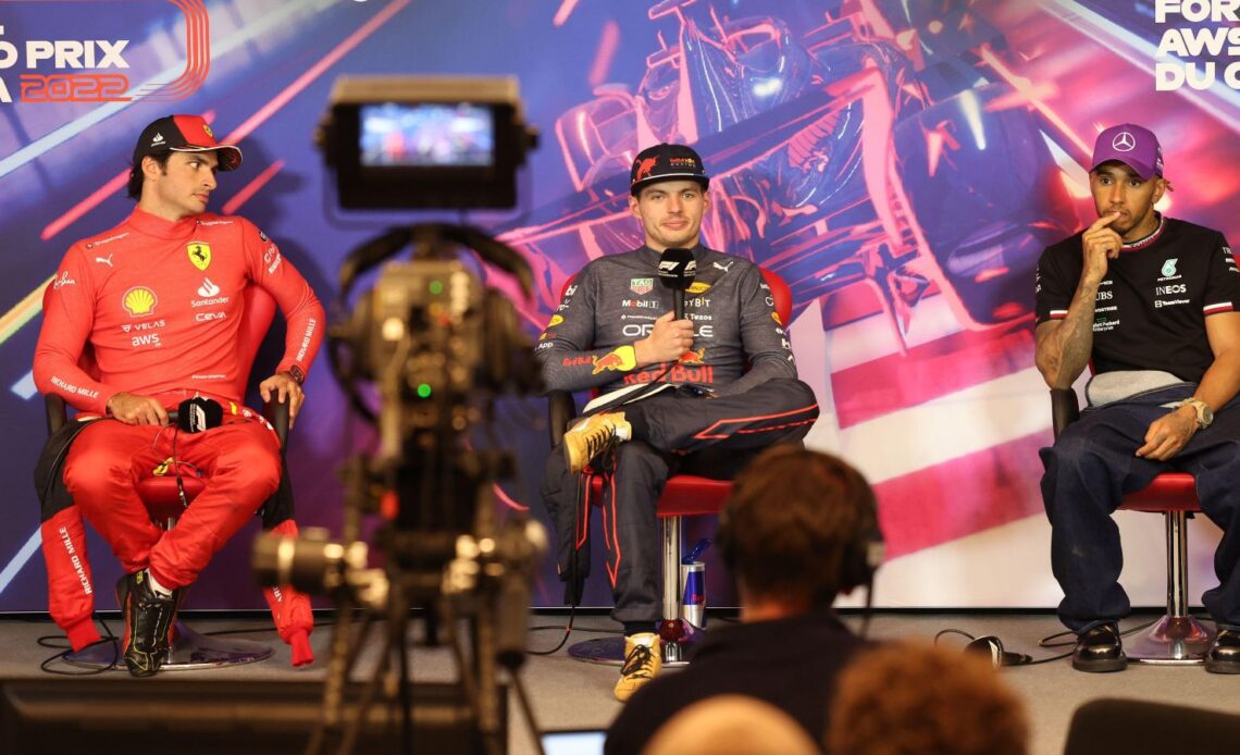 Carlos Sainz, Max Verstappen and Lewis Hamilton in front of a TV camera. Montreal, June 2022.