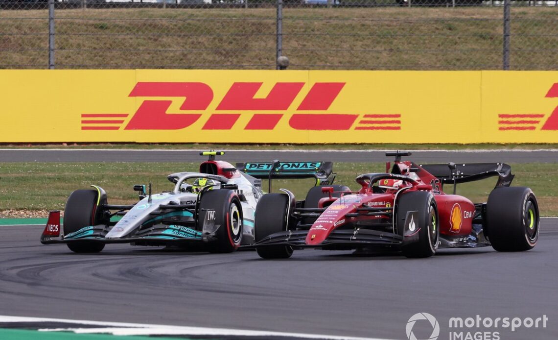 Lewis Hamilton, Mercedes W13, battles with Charles Leclerc, Ferrari F1-75
