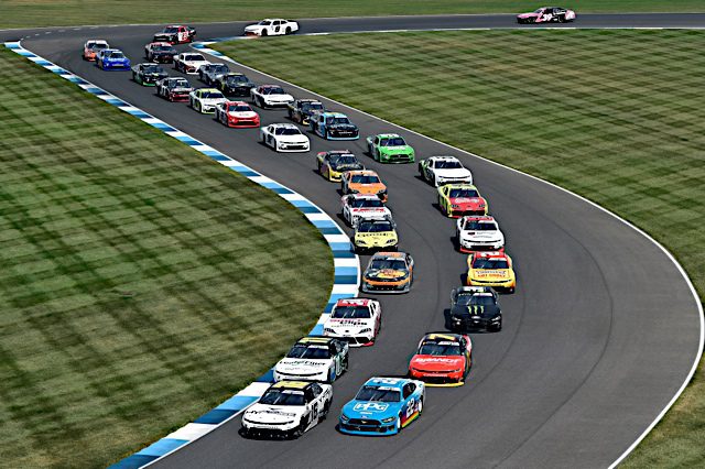 The NASCAR Xfinity Series cars run in a pack through Indianapolis Motor Speedway's infield, NKP