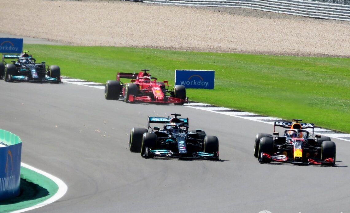Lewis Hamilton, Mercedes W12 and Max Verstappen, Red Bull Racing RB16B
