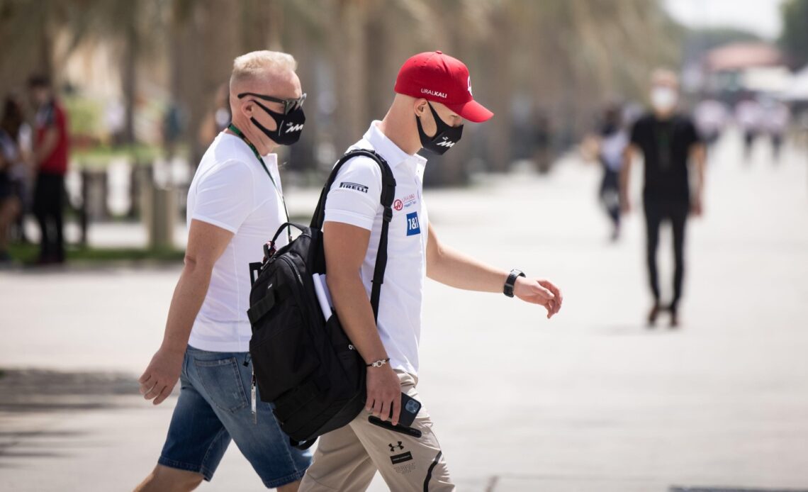 Dmitry Mazepin and Nikita Mazepin in the paddock. Bahrain, March 2021.