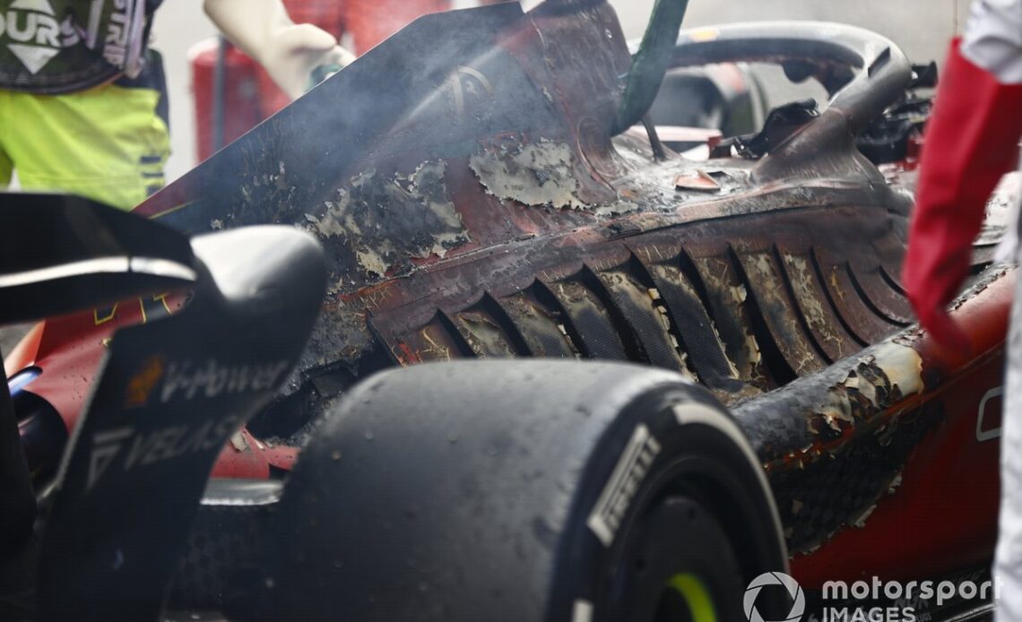 The burned out car of Carlos Sainz, Ferrari F1-75, after a fire causes his retirement