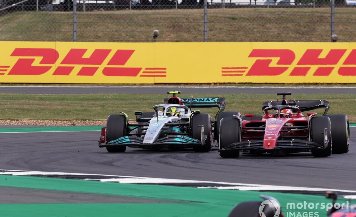 Lewis Hamilton, Mercedes W13, battles with Charles Leclerc, Ferrari F1-75