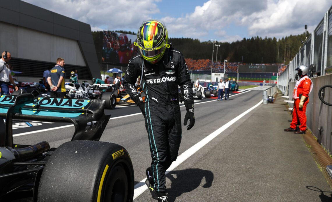 Lewis Hamilton looking at the rear of his W13. Austria July 2022