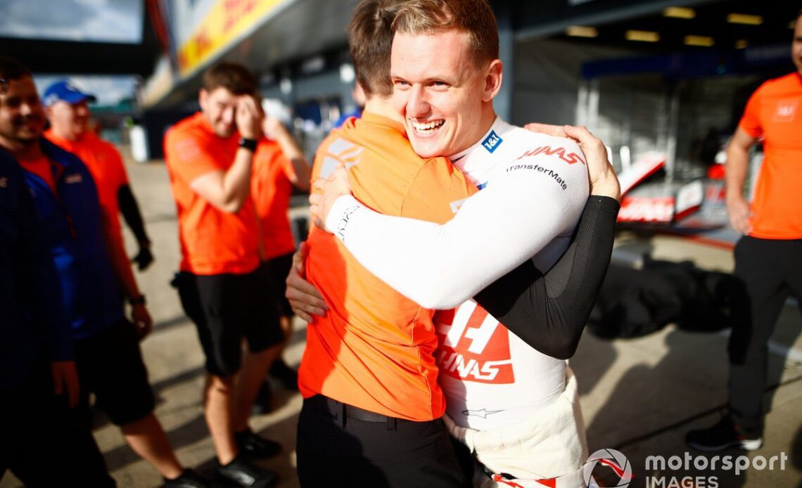 Mick Schumacher, Haas F1 Team, celebrates with his team after securing his first points in F1