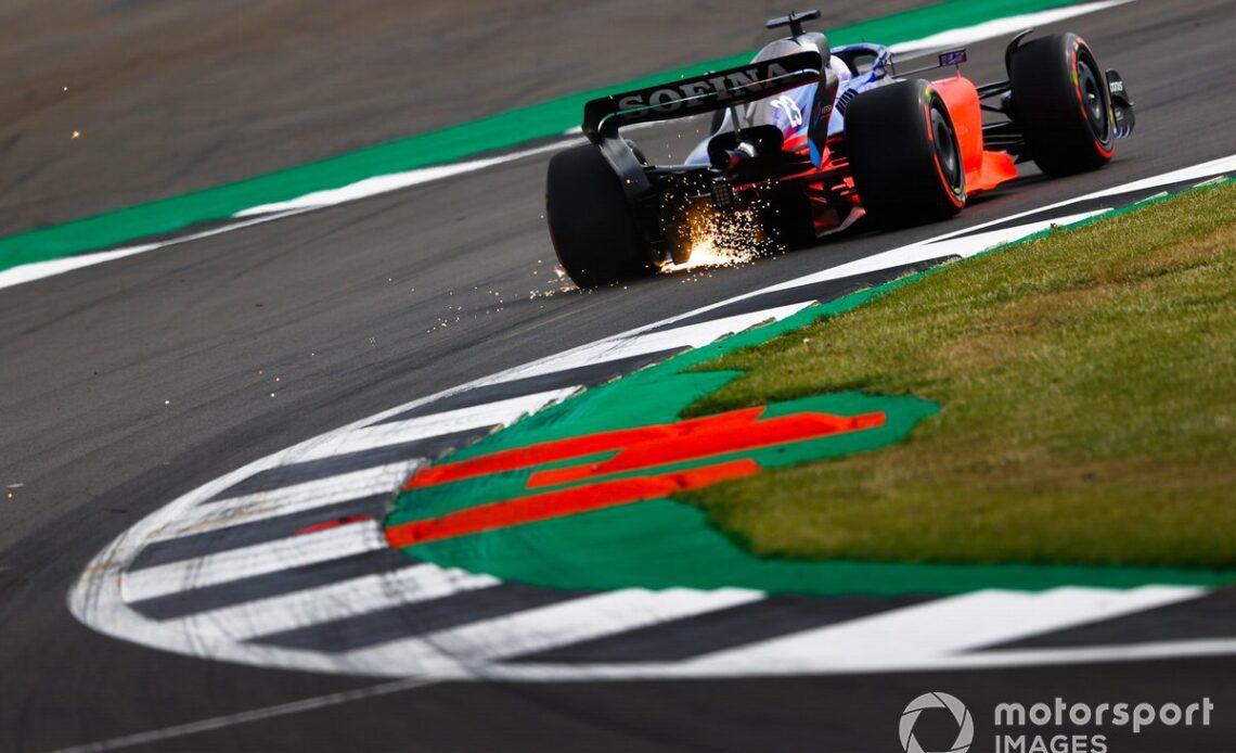 Alex Albon, Williams FW44, kicks up sparks